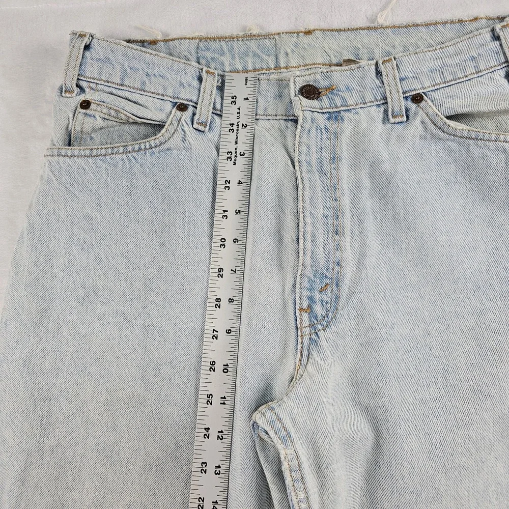 Vtg Levi's 560 Orange Tab Jeans 34x29 90s USA Loose Tapered Light Wash Raw Hem